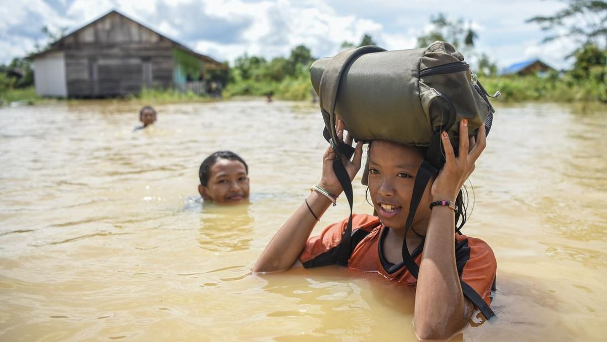 banjir-di-desa-adat-pampang-samarinda-1_169.jpeg